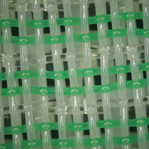Can you explain the specification of the fabric and how it impacts paper formation and drainage?