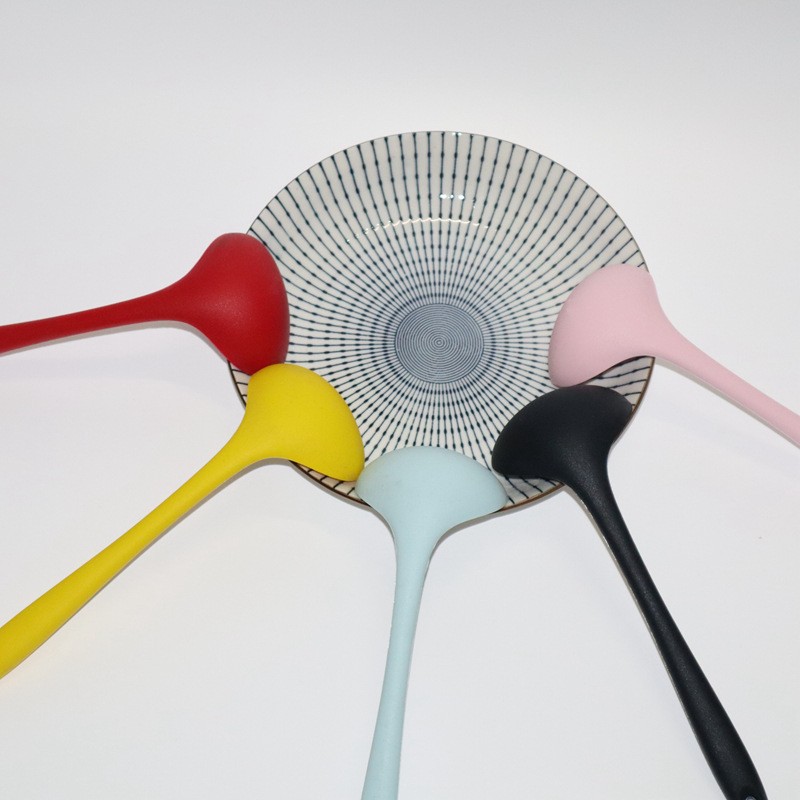 Features and considerations related to silicone soup spoons