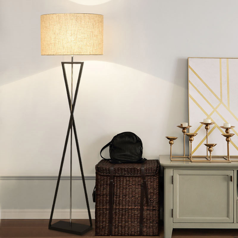 Features and aspects associated with tripod floor lamps